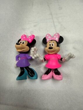 Disney Minnie Mouse Figures in Pink and Purple Dresses